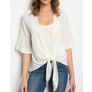 Delicate ivory tie-front shrug